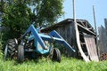 Free Tractor In A Field Royalty Free Stock Image - 1003726