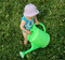 Free Litlle Girl And Watering-pot Stock Images - 1010834