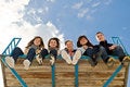 Free Company Of Five Young People Sitting Together Royalty Free Stock Photo - 11659815