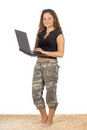 Free Female Teenager Standing On The Carpet With Laptop Royalty Free Stock Photos - 1311228