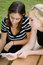 Free Friends On Cell Phone Together (Beautiful Young Blonde And Brune Stock Image - 1323161