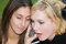 Free Friends On Cell Phone Together (Beautiful Young Blonde And Brune Stock Image - 1323201