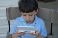 Free Game Playing Boy Royalty Free Stock Photos - 1417998