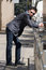 Free Young Businessman Leans On Handrails Royalty Free Stock Photography - 14201377