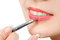 Free Applying Liquid Glossy Lipstick Stock Photography - 14423432