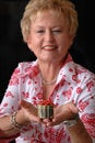 Free Mature Woman With Christmas Gift Royalty Free Stock Photography - 1461707