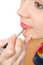 Free Applying Liquid Glossy Lipstick Royalty Free Stock Photos - 14649788