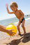 Free Little Boy Plas Ball At The Seaside Stock Image - 15082891