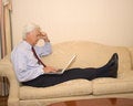 Free Senior Businessman On Laptop Royalty Free Stock Photo - 1549335