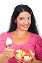 Free Smiling Woman Giving A Piece Of Melon Royalty Free Stock Image - 15572986
