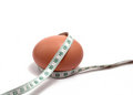 Free Measurement Tape Wrapped Around The Egg Stock Photos - 1566043