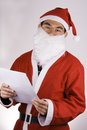 Free Santa Claus With Check List Royalty Free Stock Photography - 1596257
