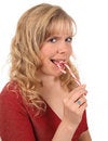 Free Woman Eating Candy Cane Royalty Free Stock Photo - 1613985