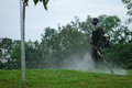 Free Worker Cutting Grass Royalty Free Stock Photos - 1618978