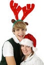 Free Adorable Teen Couple In Christmas Hats. Royalty Free Stock Images - 1677579
