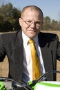 Free Businessman On Dirt Bike Royalty Free Stock Photography - 1678597