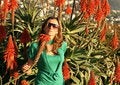 Free Beautiful Young Woman With Red Flowers Royalty Free Stock Image - 1713446