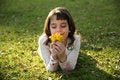 Free Girl Looking At A Flower Royalty Free Stock Photo - 1743375