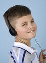 Free Young Boy Listening To Music On Headphones Stock Image - 1782281