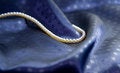 Free Pearl Necklace On Dark Blue Silk Stock Images - 1785104