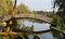 Free Footbridge Over A Pond Royalty Free Stock Photos - 18353918