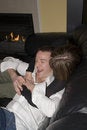 Free Happy Couple Relaxing On Couch Royalty Free Stock Photos - 1921948