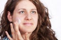 Free Caucasian Young Woman Applying Moisture Stock Image - 19554111