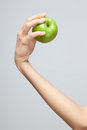 Free Hand Holding Apple. Royalty Free Stock Photography - 19588797