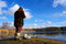 Free A Fisherman Looks After A Rod On The Shore Royalty Free Stock Images - 2034479