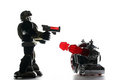 Free 2 Toy Robots In Backlight Royalty Free Stock Photos - 2117238