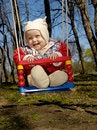 Free Swinging Little Boy Stock Photo - 2240220