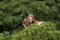 Free Cute Girl Hiding In Bushes Stock Images - 2259344