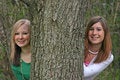 Free Girls Peeking Around A Tree Royalty Free Stock Photos - 2331098