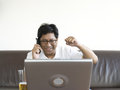 Free Asian Man Working On Laptop Royalty Free Stock Photos - 2369778