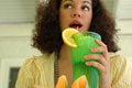 Free Attractive Young Woman Drinkin Stock Photos - 2391893
