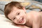 Free The Cheerful Child Lays Stock Photos - 2439883