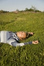 Free Man Lying On A Lawn Royalty Free Stock Images - 2607629