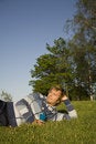 Free Man Lying On A Lawn Royalty Free Stock Photo - 2607695