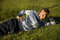 Free Man Lying On A Lawn Royalty Free Stock Images - 2607579