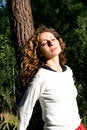 Free Leaning Against A Tree Royalty Free Stock Photography - 2704957