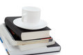 Free Pile Of Books And A White Cup Royalty Free Stock Image - 2742426