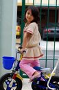 Free Little Girl And Bicycle Stock Images - 2744684
