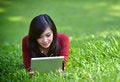 Free Pretty Woman Using Tablet Royalty Free Stock Photography - 27473857
