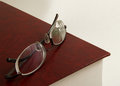 Free Glasses On Top Of Book Royalty Free Stock Photography - 2906457