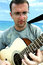 Free Young Man Playing The Guitar Royalty Free Stock Photos - 2905398