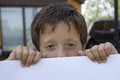 Free Boy Keeps Sheet Of Paper Stock Photo - 2910080