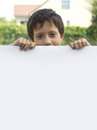 Free Boy Keeps Sheet Of Paper Stock Images - 2923574