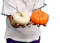 Free Girl Holding Pumpkins Stock Image - 323971