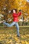 Free Girl In Red Jacket Jumps In Park Royalty Free Stock Photos - 3907148