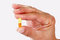 Free Capsule In A Hand Royalty Free Stock Image - 3968226
